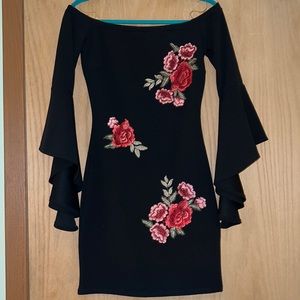 Black dress with red floral pattern